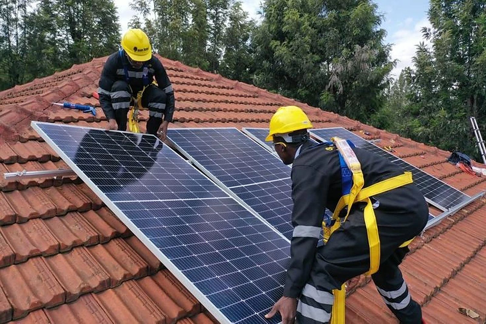 Technicians working on a roof